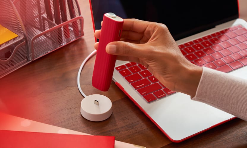 IQOS ILUMA ONE w stacji ładującej